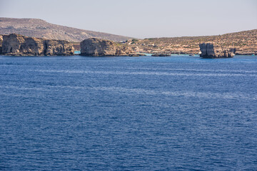 Blue Lagoon on the island of Comino seen from the sea - 714663211