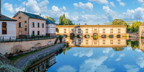 Le Petite France, the most picturesque district of old Strasbourg. Houses with reflection in waters...