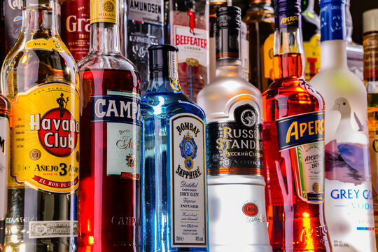 Bottles of assorted global hard  liquor brands in a bar