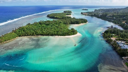 Foto op Canvas Tropical island coral lagoon beautiful sea view from above. Cook Islands Rarotonga. Cook islands paradise. Beautiful tropical island of Rarotonga view of the blue sea in the lagoon. © pettys