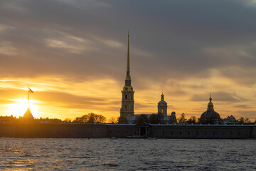 Peter and Paul Fortress against the background of the cloudy May sunset. Saint Petersburg, Russia