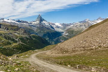 Amazing view of touristic trail near the Matterhorn in the Swiss Alps.