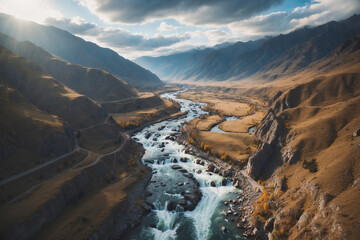 A river located in the middle of the mountains from a drone's point of view - obrazy, fototapety, plakaty