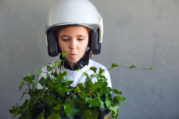 Astronaut futuristic kid girl wearing white uniform and helmet