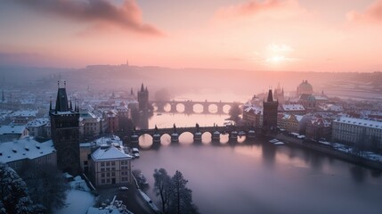 Fototapeta premium Charles bridghe with beautiful historical buildings at sunrise in winter in Prague city in Czech Republic in Europe.