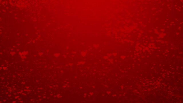 Animation of bright red heart-shaped 3d lights moving on a red background.