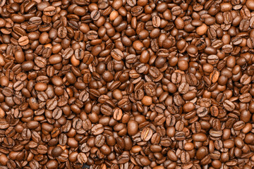 Roasted coffee beans background top view