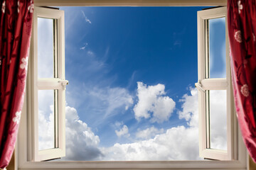 Open window onto fresh blue skies and white clouds