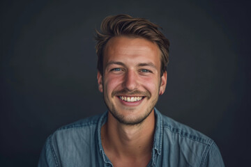 Fototapeta premium A man with a beard is smiling for the camera