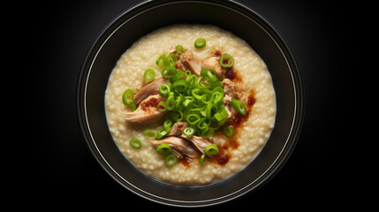 A bowl of comforting chicken congee, a popular dish for suhoor, the pre-dawn meal