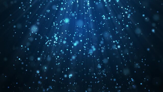 青のキラキラ背景。光線。海中。ループ動画。
