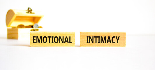Emotional intimacy symbol. Concept words Emotional intimacy on beautiful wooden blocks. Beautiful...