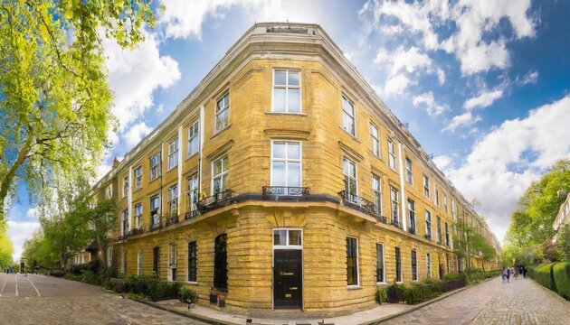 Exterior Of Georgian Residential Apartment Building Made In Yellow Brick In A Luxury Residential Area Of West London