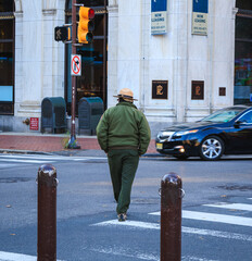 cop walking in the street
