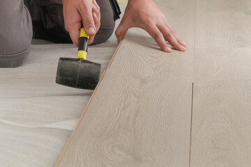 Fototapeta na wymiar Step by step of laminate flooring installation 