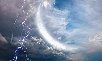 Night sky with clouds on the background flashes of lightning with crescent moon