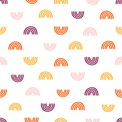 Seamless pattern with colorful rainbows