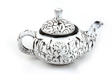 White ceramic teapot insulated on a white background.