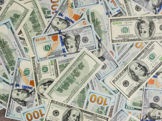 Abstract texture of 100 dollar new bills.