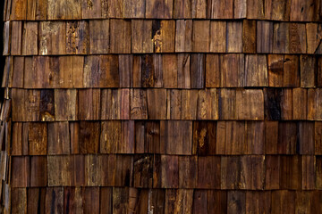 Wooden pieces fence wall for background.