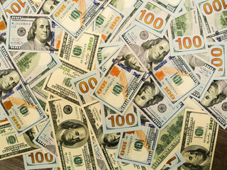 Background of 100 dollar bills, top view.