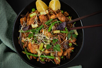 baked marinated chicken breast with soba noodles, celery, beans and parsley