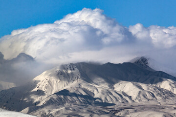 snow covered mountains in winter
