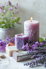 Fototapeta na wymiar Spa, purple salts and lit candle with lilac flowers