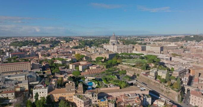Aerial view of St. Peter's Cathedral, Rome, Italy. Cityscape of the Vatican with the square in front of the Catholic Cathedral. High quality 4k footage
