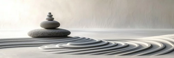 Foto auf Acrylglas Perfectly stacked stones in a tranquil Zen garden © Simone