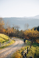 Going the distance. Shot of a young man enjoying a hike through the mountains. a handsome man with an athletic build is traveling in the mountains. landscape 
