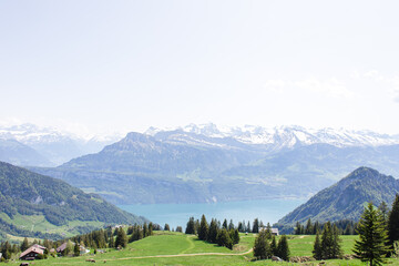 Hiking trail and Lake Lucerne with the mountains of the Swiss Alps in the background
