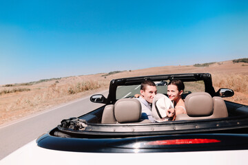 Happy couple enjoying road trip