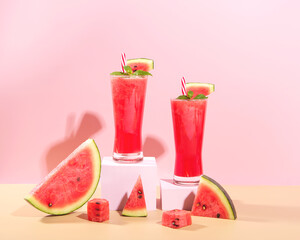 Fresh watermelon juice and watermelon slice on pastel color background. cooling beverage summer...