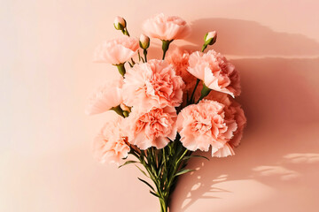 A bouquet of spring pink flowers against a pink wall background