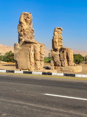 Colossi of Memnon, two massive stone statues representing the pharaoh, Luxor, Egypt