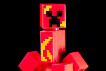 Obraz premium LEGO Minecraft Lava Creeper Mob on the black background