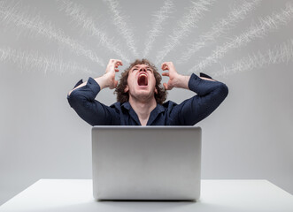Hair-pulling frustration at laptop, shock lines radiate