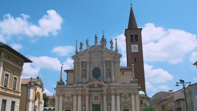 Historic center of Italian city. Busto Arsizio town, piazza San Giovanni with Basilica San Giovanni Battista in province of Varese, Lombardy, Italy. Travel destination