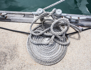 Fototapeta premium Coiled rope on boat's deck