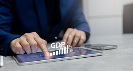 close up manager businessman hand point dashboard report on digital tablet to read and check...