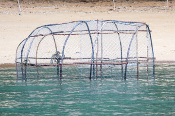 Basket fish trap catch crabs,lobsters fishes on  the ocean