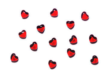 Red hearts on a white background. Isolated on white. Background for a postcard