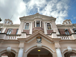 Hong Kong University Main Hall, one of the famous heritage building landmark in Hong Kong, as a british colonial heritage. Preserved well with palm trees, gardens, intricate and ornamental details.