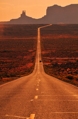 Classic view from US Route 163 towards the buttes and mesas of the Monument Valley Navajo Tribal Park, Utah-Arizona border, USA.