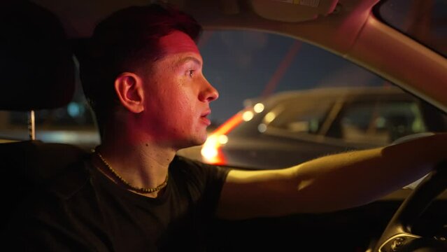 Man swears while driving at night