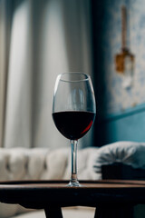 Glass of merlot wine in luxury vintage settings