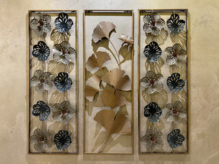 Accessories of leaves floral and flowery shape dyed in blue and gold colors or brass color, for wall accessories interior design