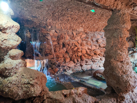 interior view of old troglodyte houses made of stone and clay, decorated with a waterfall, designed in accordance with local tradition, sub-Saharan architecture of Ghardaïa. Oasis M'zab, Algeria.