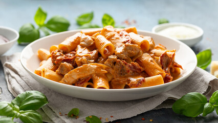 Gochujang Pasta with chicken, sun dried tomatoes and pecorino cheese.